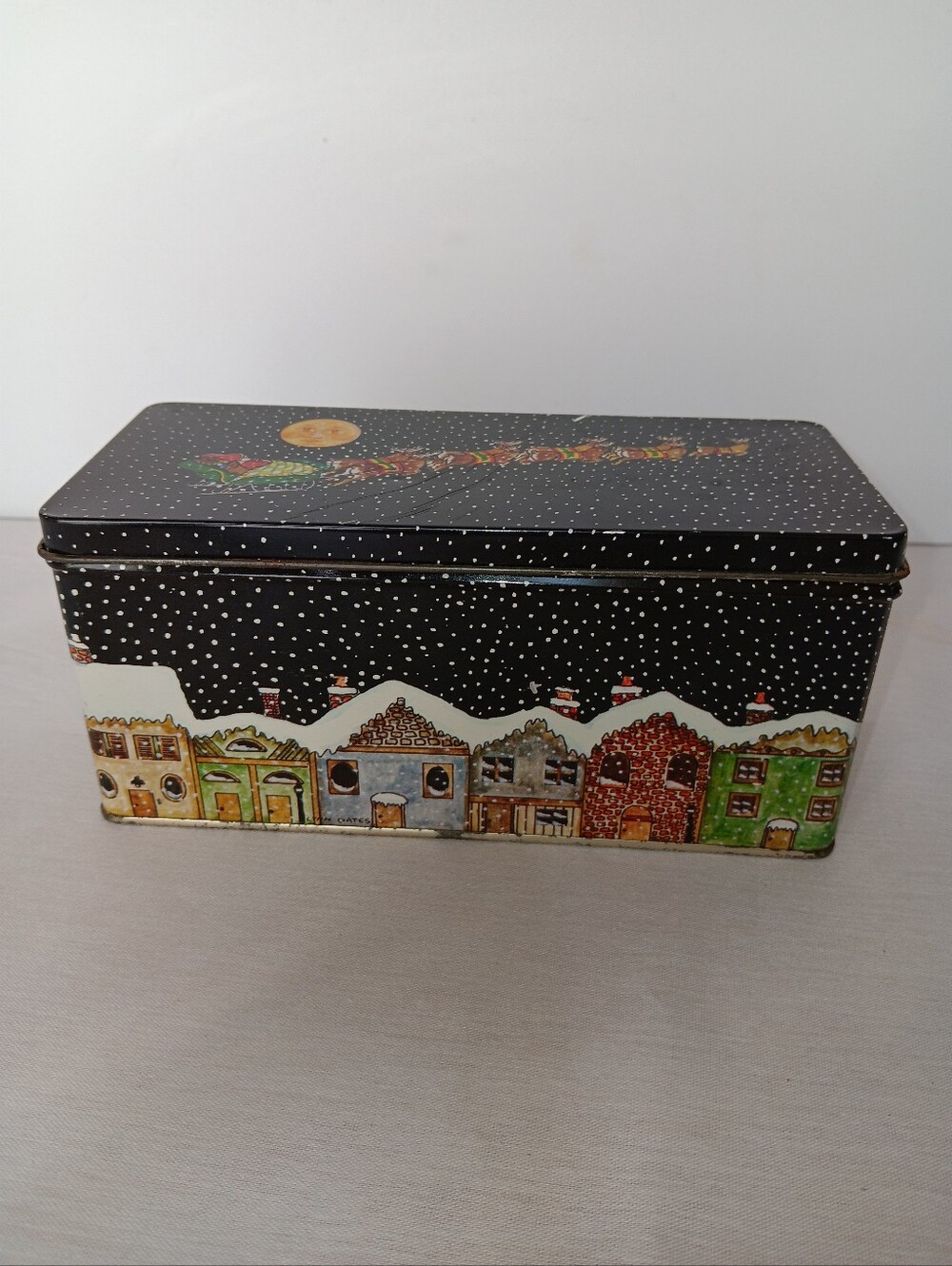 Vintage Christmas Santa w/Reindeer Over Houses Snowing Holiday Tin